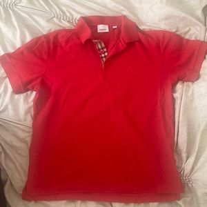 Burberry polo shirt.